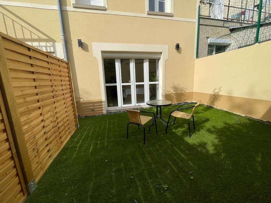 2-appartement Rdc Avec Jardin *